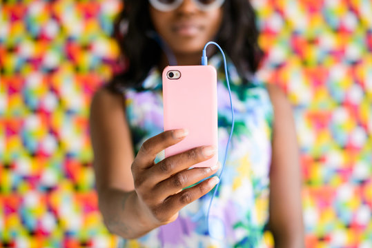 Close-up of woman's hand holding a mobile phone