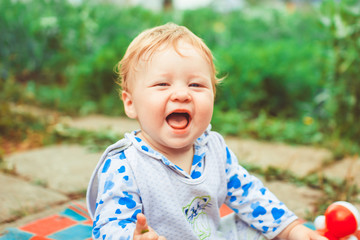 a child plays on the grass