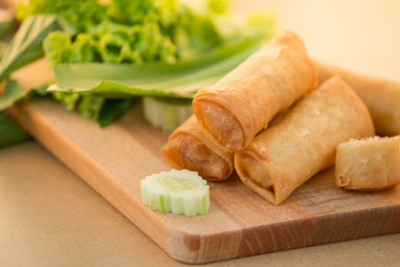 four piece of fried chicken on wood Cutting board