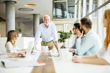 Business people discussing a strategy and working together in office