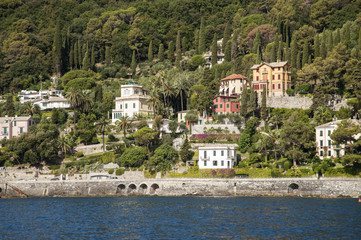 Santa Margherita Ligure, Liguria Italia - watching the coast from the sea. beautiful houses and villas with the typical architecture of the houses just behind the beaches