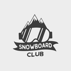 Snowboard club logo, label or badge template. Snowboarding symbol with snowboard glasses and mountains. WInter extreme sport.