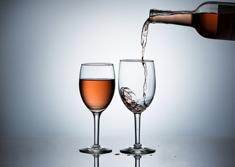 Pouring the second glass.