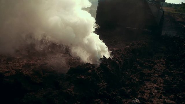 Smoke grenade on background armored personnel carrier at battle field