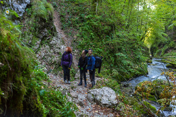 Tourists hiking on a trail