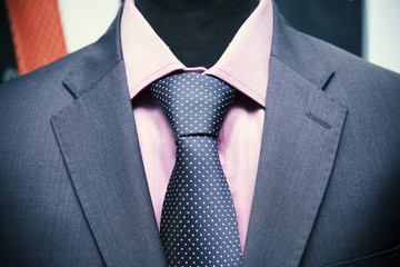 shirt tie and suit jacket on a mannequin