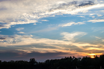 Beautiful Autumn Sunset by the forest	