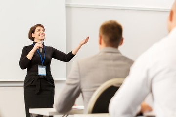 group of people at business conference or lecture