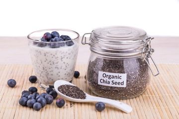 Chia seeds pudding with blueberry fruits, healthy nutritious anti-oxidant superfood.