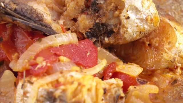 Fried pollock with onions