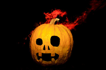 pumpkin head made with hands and flame
