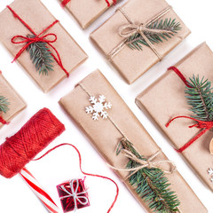 Christmas composition. Festive gift boxes collection with decorations and pine tree for design on white background. .