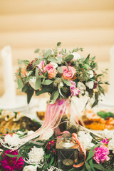Beautiful wedding bouquet with different flowers, roses