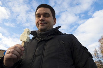 the ice cream at the man ends