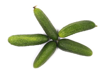 Small cucumbers isolated on white background, top view