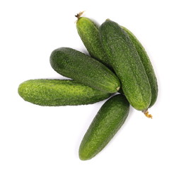Small cucumbers isolated on white background, top view