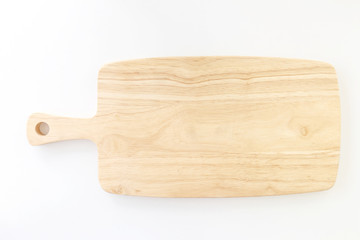Top view of Wooden chopping board on the white background.