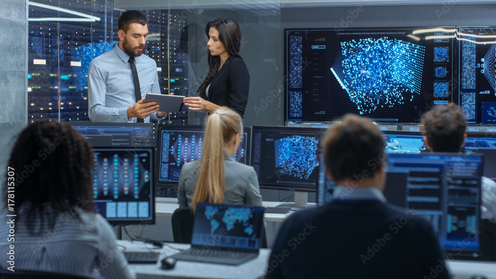 Poster Head of the Department and Project Manager Discuss Work Process Using Data on Tablet Computer. Multi-Ethnic Team Builds Neural Network with Integrated Machine Learning.
