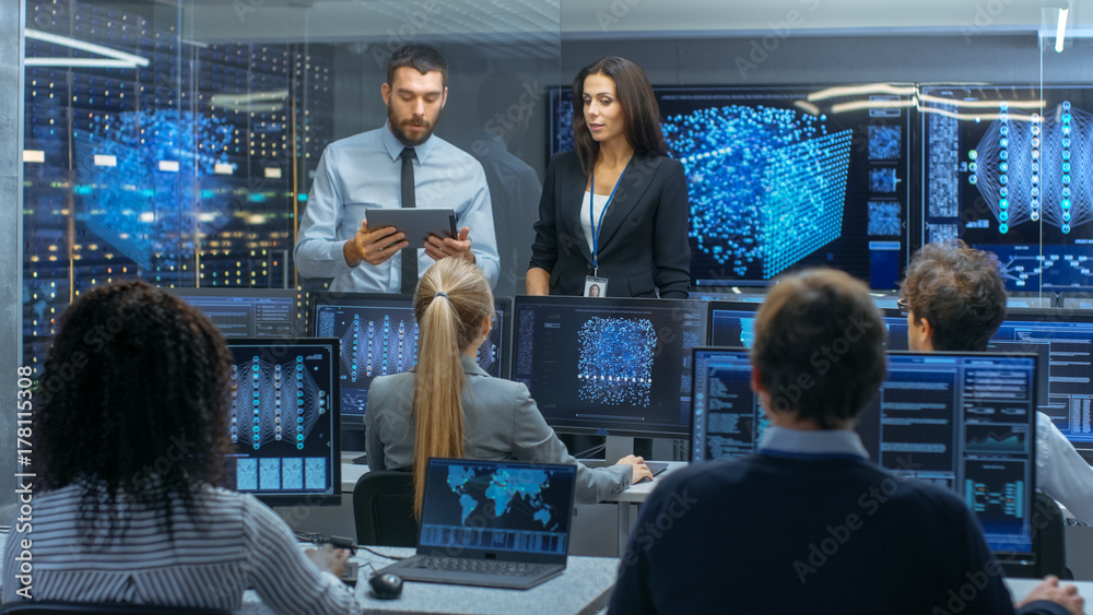 Poster Head of the Department and Project Manager Discuss Work Process Using Data on Tablet Computer. Multi-Ethnic Team Builds Neural Network with Integrated Machine Learning.