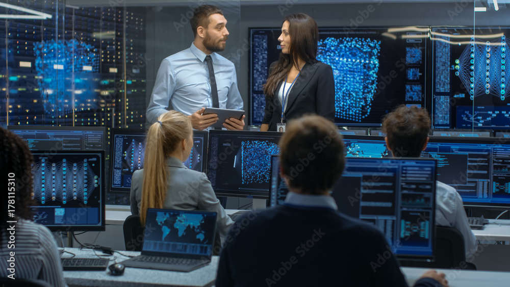 Poster Head of the Department and Project Manager Discuss Work Process Using Data on Tablet Computer. Multi-Ethnic Team Builds Neural Network with Integrated Machine Learning.