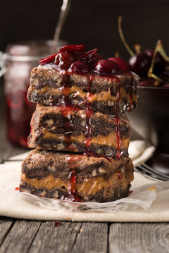 Delicious Carmel Brownies with Cherry Compote