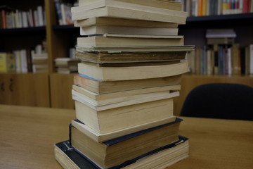 pile of books in the library