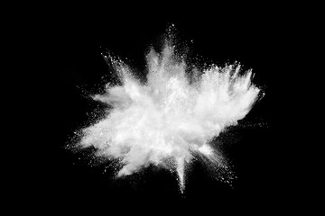 Explosion of white powder isolated on black background. - obrazy, fototapety, plakaty