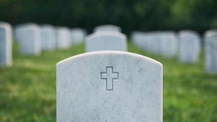 Memorial: Cross On Military Headstone In Cemetary