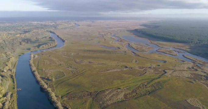 River floods meadows from the air