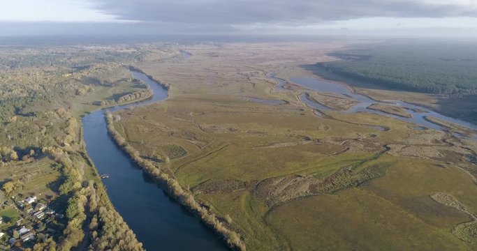 River floods meadows from the air