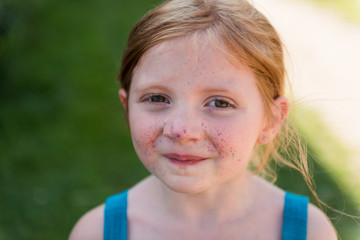 Girl with paint freckles