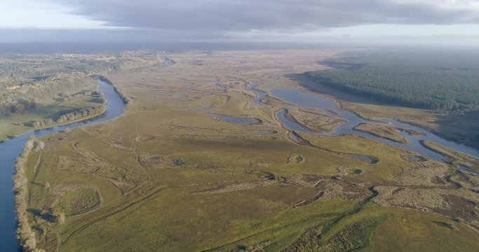 River floods meadows from the air
