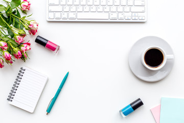 woman desk design with cosmetics, petals and notebook white background top view mock-up