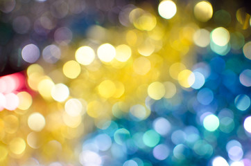 Obraz premium Bright colorful Christmas background, blurred bokeh holiday