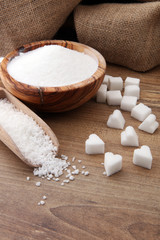 Various types of sugar, white sugar on wooden table.