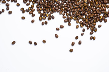 Flay lay style, Medium dark Roasted peaberry coffee beans isolated on white background with copy space for text.