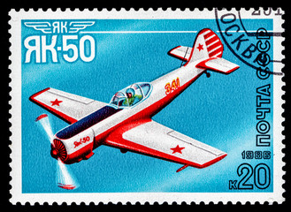 A stamp printed in the USSR show airplane Yak-50