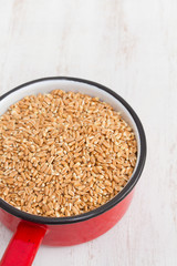 uncooked spelt in dish