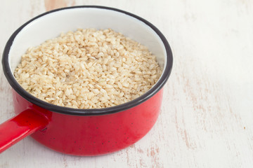 uncooked integral rice on dish