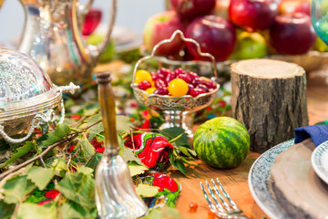 Festive table decorated with fruits closeup nobody