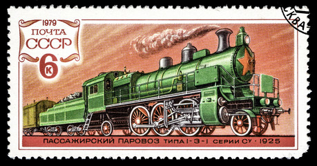 Fototapeta na wymiar A Stamp printed in the USSR shows vintage Russian steam locomotive, circa 1979