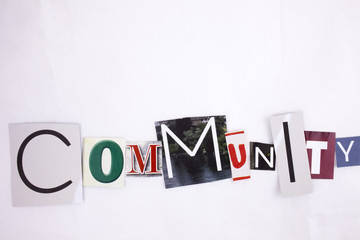 A word writing COMMUNITY made of different magazine newspaper letter magazine different letters for Business concept