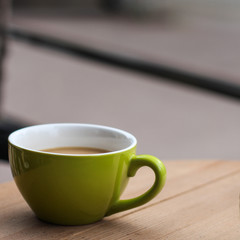 cup of coffee beverage with milk (cappuccino) in the open air