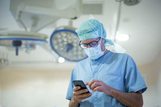 Male Doctor Using Smartphone