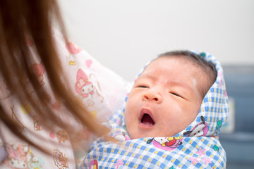 Asian Baby with Powder on Face