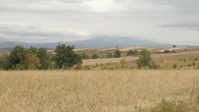 Slow tilt on Eastern Serbia landscape with cloudy sky footage - Famous Stol and Deli Jovan mountains