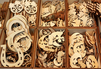 Rows of unpainted wooden  figures 