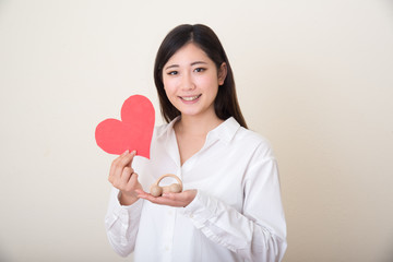 model car in young asian woman's hands