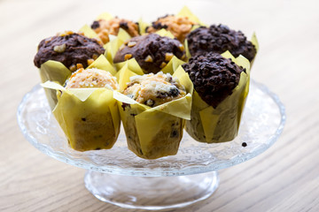 Chocolate muffins on wood