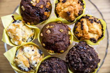 Chocolate muffins on wood